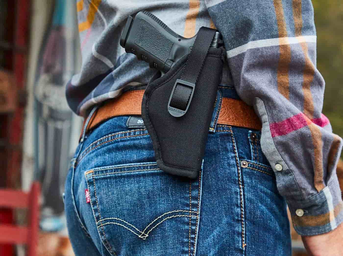 How should a woman carry her firearm, in her purse or in a holster? - Quora